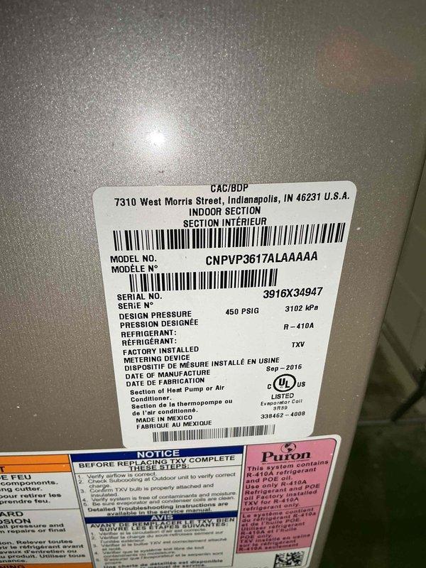 Completed preventative maintenance tune-up on two residential AC units located in basement. Both systems are ground-level installations manufactured in September 2016, utilizing R-410A refrigerant with TXV metering devices. Performed standard maintenance procedures including inspection of indoor air handler components, verified manufacturer specifications on unit model CNPVP3617ALAAAAA4, and replaced 20x25x1 air filter showing moderate dust accumulation.