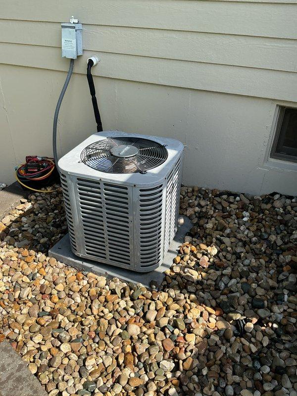 Completed comprehensive cooling system tune-up on single outdoor condensing unit located at rear of residence. Performed standard preventive maintenance procedures including inspection of condenser coil, fan motor operation, refrigerant levels, electrical connections, and thermostat functionality. Unit operating within normal parameters with Emerson Sensi smart thermostat controlling system properly; no deficiencies noted during service visit.