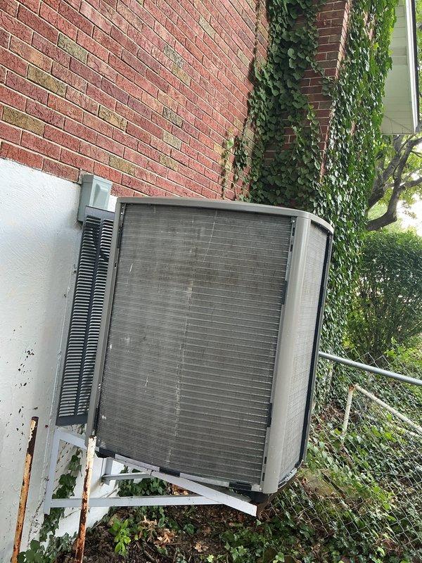 Completed comprehensive cooling system tune-up on 2-year-old residential air conditioning unit. Performed full system diagnostics including refrigerant pressure testing, temperature differential measurements, and operational assessment of outdoor condenser unit mounted on exterior wall. All components operating within manufacturer specifications; system showing proper superheat and subcooling values with adequate airflow through evaporator coil.