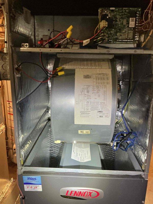 Performed comprehensive cooling system tune-up on a 2-year-old Lennox air conditioning system with no reported performance issues. Completed full inspection of blower motor assembly, verified proper operation of squirrel cage fan, inspected electrical connections and wiring throughout the system, and examined control board components. Confirmed all mechanical and electrical components operating within normal parameters, system performing efficiently with no deficiencies noted.