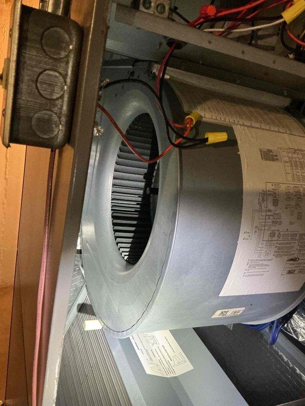 Performed comprehensive cooling system tune-up on a 2-year-old Lennox air conditioning system with no reported performance issues. Completed full inspection of blower motor assembly, verified proper operation of squirrel cage fan, inspected electrical connections and wiring throughout the system, and examined control board components. Confirmed all mechanical and electrical components operating within normal parameters, system performing efficiently with no deficiencies noted.