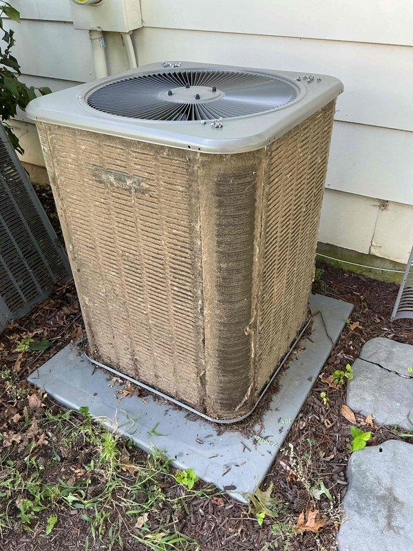 Responded to no cooling complaint on 2-year-old Lennox unit with reported rattling and pulsating noises that had progressively worsened throughout the summer. Upon arrival, performed complete system diagnostic including inspection of outdoor condenser unit, which showed significant dirt accumulation on exterior cabinet and coil surfaces, as well as debris buildup around base affecting airflow. Inspected electrical compartment and verified all wire connections at terminal blocks were secure with no signs of arcing or loose terminations. Checked compressor operation and found unit cycling properly but noted excessive vibration contributing to noise complaint. Cleaned condenser coil and cabinet exterior to restore proper heat transfer efficiency. Verified refrigerant charge, amperage draws, and capacitor values were within manufacturer specifications. Cleared vegetation and debris from around unit perimeter to ensure adequate clearance for proper airflow. Unit restored to normal operation