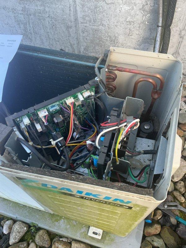 Responded to no-cool complaint on Daikin 1.5-ton wall-mounted mini-split heat pump system located in sunroom. Upon arrival, inspected outdoor condensing unit and verified registration certificate showing equipment installed in 2020 and still under manufacturer's 10-year parts warranty. Removed outdoor unit cover to access internal components and performed diagnostic inspection of control board, wiring harnesses, refrigerant lines, capacitors, and electrical connections. Documented system condition with photos for warranty claim processing, as customer had been previously advised by another contractor that outdoor unit was malfunctioning.