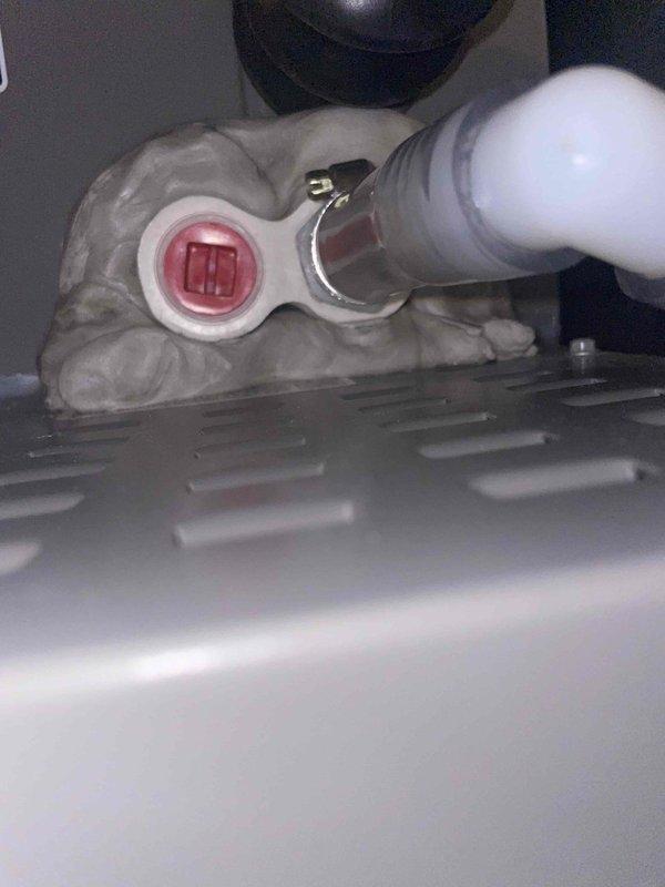 Responded to callback for musty odor complaint on cooling unit less than one year old located in side yard. Upon inspection, found condensate drain line improperly installed with inadequate pitch and foam insulation blocking proper drainage. Cleared condensate line, verified proper drainage flow, and replaced dirty air filter with new HDX 16x25x1 pleated filter. System tested and operating normally with no odor present at time of departure.