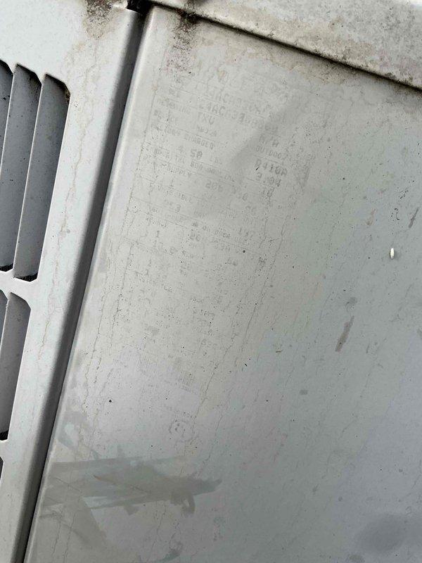 Responded to no cooling complaint on 16-year-old air conditioning system. Upon arrival, confirmed outdoor unit was completely unresponsive with no operational sounds or compressor activity. Performed diagnostic inspection of condenser unit and identified failed condenser fan motor. Motor showed no electrical continuity and exhibited signs of age-related deterioration consistent with equipment lifespan. Documented existing conditions including dirt accumulation and environmental wear on unit components. Replaced defective condenser fan motor with new OEM-equivalent component, restored electrical connections, and verified proper system operation. Unit now cycling normally with compressor engaging and condenser fan running at proper speed.