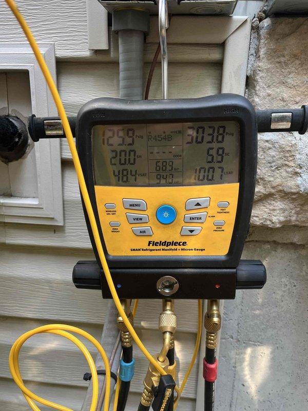 Replaced defective evaporator coil on residential HVAC system. Verified refrigerant pressures and system operation using diagnostic manifold gauge after installation. System restored to proper cooling operation, with secondary system available for continued climate control during repair.