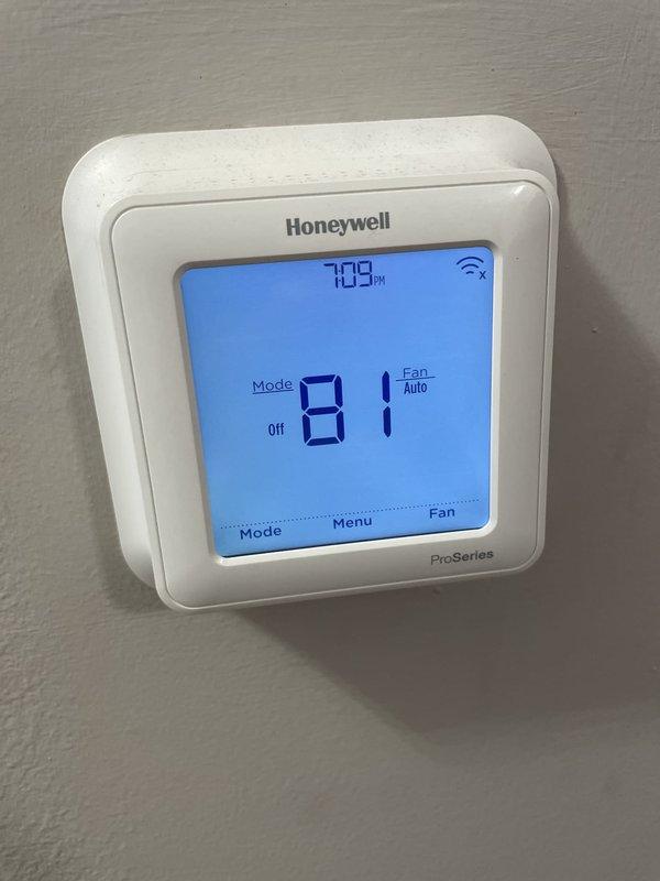 Responded to no cooling complaint on seven-year-old air conditioning system. Upon arrival, found thermostat display showing indoor temperature of 81°F while set to cool at 72°F, with system status indicating "Off" rather than actively cooling. Verified thermostat was calling for cooling but unit was not responding to demand. Diagnosed and resolved issue, restoring proper cooling operation. System tested and confirmed operational with thermostat properly communicating with outdoor unit and maintaining desired temperature setpoint.