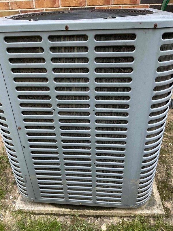 Responded to callback for air conditioning unit not cooling below 80 degrees. Upon arrival, inspected outdoor condensing unit and found accumulated debris beneath top grille restricting airflow to compressor compartment. Removed protective grating, cleared leaves and organic matter from unit interior, and verified all mechanical components operational. Unit tested successfully with proper airflow restored and cooling cycle functioning within normal parameters.