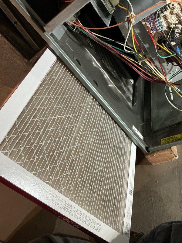 Completed comprehensive cooling season tune-up on basement AC unit, including inspection of air handler, evaporator coil, electrical connections, and control board. Verified proper airflow through pleated filter media, tested all safety controls and circuit functionality, and documented system condition with photos showing clean wiring terminations and operational components. All systems operating within manufacturer specifications with no immediate service needs identified.