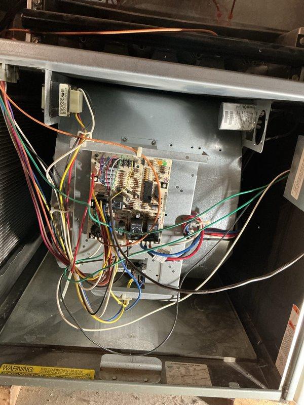 Completed comprehensive cooling season tune-up on basement AC unit, including inspection of air handler, evaporator coil, electrical connections, and control board. Verified proper airflow through pleated filter media, tested all safety controls and circuit functionality, and documented system condition with photos showing clean wiring terminations and operational components. All systems operating within manufacturer specifications with no immediate service needs identified.