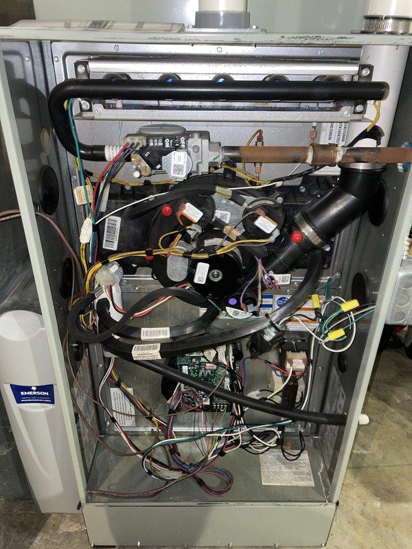 Completed comprehensive heating maintenance tune-up on 9-year-old Trane furnace system. Performed full system inspection including burner assembly, heat exchanger, blower motor, electrical connections, and gas pressure verification. Inspected and documented internal components, wiring harnesses, and mounting hardware; confirmed all systems operating within manufacturer specifications with no deficiencies noted.