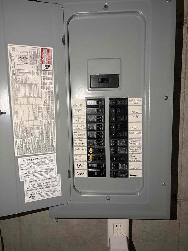 Completed installation of customer-provided thermostat in 4-year-old residential property. Verified whole house electrical system functionality, including main service panel with properly labeled circuit breakers controlling HVAC, dryer, hot tub, and other household circuits. Confirmed exterior meter installation and service entrance conduit configuration met code requirements prior to proceeding with thermostat installation as requested.