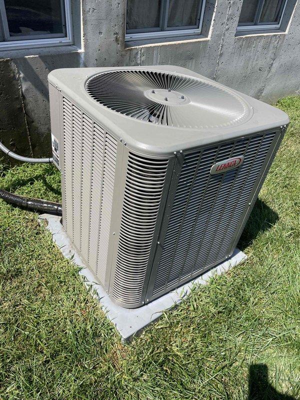 Completed comprehensive cooling system tune-up on 2-year-old Lennox air conditioning unit. Performed full preventive maintenance inspection including condenser coil cleaning, electrical connections check, refrigerant level verification, and system performance testing. Unit operational and running efficiently with no issues identified; condenser coils found in clean condition and all components functioning within manufacturer specifications.