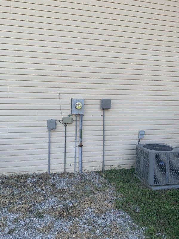 Completed electrical panel replacement on residential property. Installed new main service panel with updated circuit breakers, relocated meter base, and ran new conduit along exterior wall to code specifications. All electrical connections tested and verified operational upon completion.