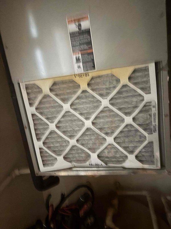 Completed preventive maintenance tune-up on rooftop air conditioning unit. Performed comprehensive system inspection, checked refrigerant levels, tested electrical connections, and verified proper operation of all components. Inspected air filter showing moderate dust accumulation and documented current condition of unit and electrical meter setup for multi-unit building.