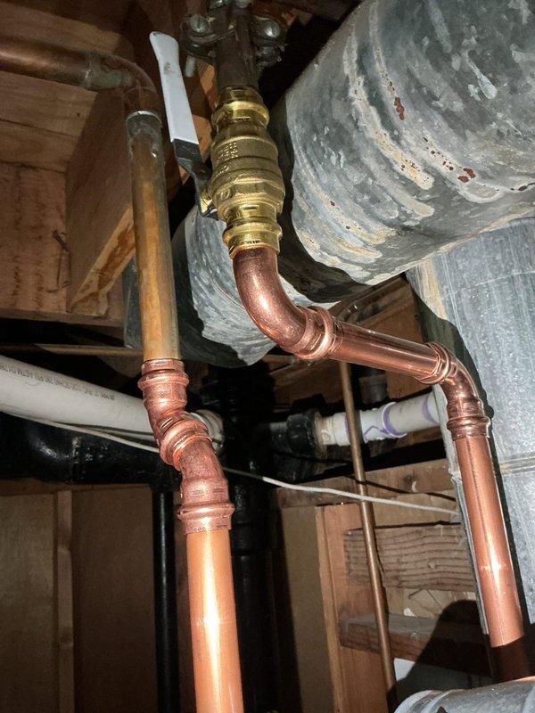 Completed installation of 40-gallon gas short water heater in accordance with permit #26plu-17223. Connected copper supply lines and gas piping to new unit, installed thermal expansion tank with proper mounting and pressure relief valve assembly, and applied required plumbing identification sticker per licensing requirements. All connections pressure-tested and verified for proper operation, with installation meeting local code requirements for residential gas water heater systems.