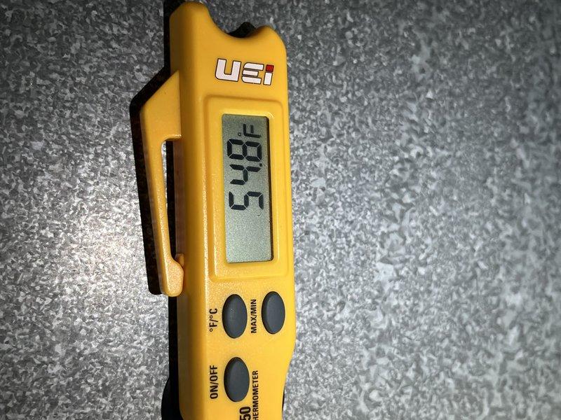 Responded to no cooling complaint on 10-year-old residential unit located at side of home. Upon arrival, performed system diagnostics and temperature measurements. Recorded supply air temperature of 58.5°F and discharge line temperature of 739°F, indicating system is operating within normal parameters and cooling effectively. Verified unit functionality and determined system is working properly with no issues found.