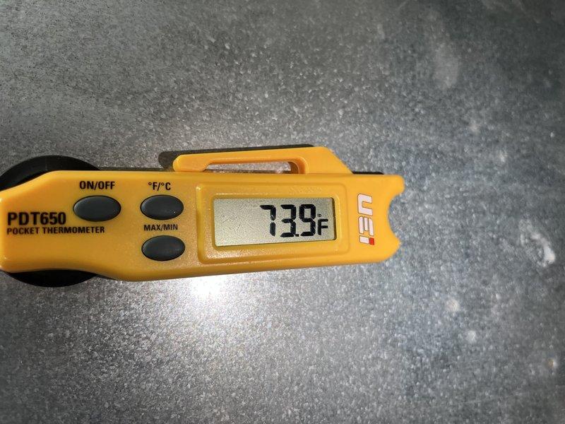 Responded to no cooling complaint on 10-year-old residential unit located at side of home. Upon arrival, performed system diagnostics and temperature measurements. Recorded supply air temperature of 58.5°F and discharge line temperature of 739°F, indicating system is operating within normal parameters and cooling effectively. Verified unit functionality and determined system is working properly with no issues found.