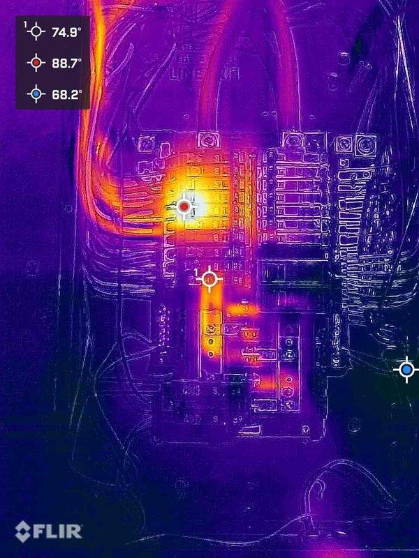 Performed comprehensive electrical troubleshooting and thermal imaging inspection of main electrical panel. Infrared scanning revealed elevated temperatures at multiple connection points, with hotspots measuring up to 88.7°F at upper bus bar terminals and 74.9°F at lower circuit breaker connections, indicating potential loose connections or excessive electrical resistance. Inspected panel interior components including dual-row circuit breaker arrangement, main bus bar terminals, and all wire terminations. Documented existing conditions showing multiple wire colors entering panel through various conduits including gray PVC and orange conduit. Provided detailed thermal imaging analysis and photographic documentation of panel conditions for estimate preparation and future corrective action recommendations.