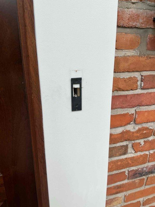 Installed low-voltage transformer to provide proper power supply for Ring doorbell camera system at building entrance. Completed electrical rough-in work, mounted transformer in interior wall access panel, and verified proper voltage output for doorbell operation.