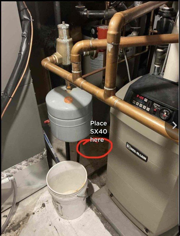 Responded to service call for boiler system tripping when hot water was called for. Upon inspection of the 10+ year old basement unit, diagnosed faulty circulator causing system lockout requiring manual reset. Recommended and documented placement location for SX40 expansion tank installation to address thermal expansion issues contributing to system instability. System tested and operational upon departure.
