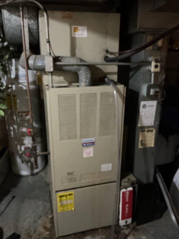 Responded to no cooling call on residential HVAC system over 10 years old. Upon arrival, contacted customer and instructed to power down unit prior to 30-minute call-ahead. Found air handler blowing warm air only with no cooling capacity. Inspection revealed significant dust and debris accumulation throughout the air handler plenum and internal components, indicating extended period without maintenance. Documented system condition including heavily contaminated ductwork, degraded airflow paths, and overall equipment age and wear. System requires cleaning, potential component replacement, and further diagnostic evaluation to restore proper cooling function.