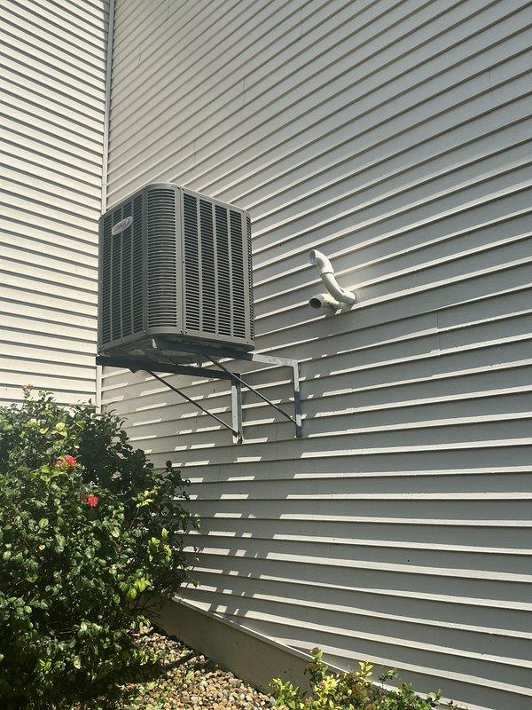 Completed comprehensive cooling system tune-up on a 10-year-old outdoor condensing unit mounted on exterior wall. Performed standard maintenance protocol including system inspection, replaced 16x25x1 air filter, and verified proper operation of all components. Unit operating within normal parameters upon completion of service.