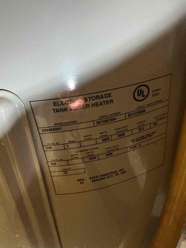 Installed a 40-gallon tall electric storage tank water heater manufactured by State Industries (Ruud brand) in a commercial building utility alcove. Connected copper supply lines, electrical conduit, and verified all plumbing connections per City of Brentwood permit requirements for commercial installation.