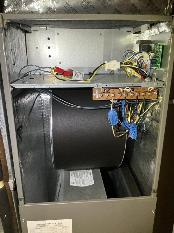 Completed comprehensive cooling tune-up maintenance on three residential air conditioning units located on the exterior side of the property. Performed standard preventive maintenance procedures on all systems including inspection of electrical components, wiring connections, control boards, and blower assemblies. Documented existing air filter condition showing installation date of May 2019, indicating overdue replacement on at least one unit's air handling system.