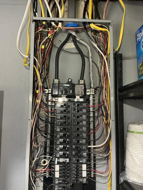 Completed installation of electric vehicle charging station with new dedicated circuit from main electrical panel. Ran conduit and wiring through attic space to charging station location, ensuring proper wire sizing and circuit protection per NEC requirements. Updated panel with appropriate breaker and verified all connections for safe operation.