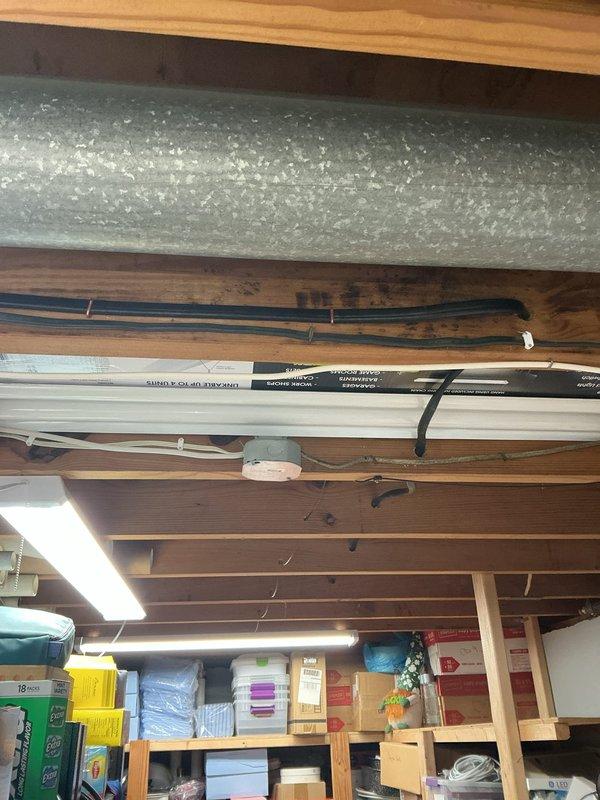 Completed installation of electric vehicle charging station with new dedicated circuit from main electrical panel. Ran conduit and wiring through attic space to charging station location, ensuring proper wire sizing and circuit protection per NEC requirements. Updated panel with appropriate breaker and verified all connections for safe operation.