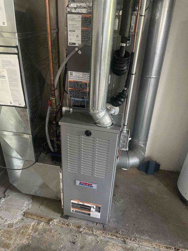 Completed heating maintenance tune-up on 15-year-old Heil furnace system found in proper working condition. Performed comprehensive inspection of unit, ductwork connections, and refrigerant lines, replaced dirty 16x25x1 pleated air filter showing significant dust accumulation, and verified all system components operating within normal parameters.