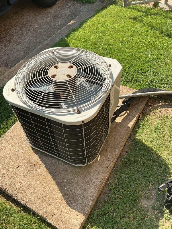 Responded to no-cooling call on a thirty-year-old residential air conditioning system. Upon arrival, performed diagnostic evaluation of outdoor condenser unit and indoor furnace system. Confirmed compressor failure on aging cylindrical condenser unit, which showed significant wear consistent with equipment age. Assessed system viability and discussed replacement options with homeowner due to advanced age of equipment and cost-effectiveness of repairs versus new installation.