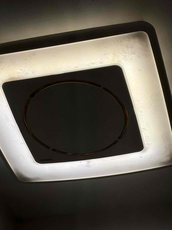 Removed existing brass chandelier with five frosted glass shades and installed customer-supplied ceiling-mounted ventilation fixture with integrated lighting in residential space. Additionally installed customer-supplied light switches as requested to complete the electrical upgrade.