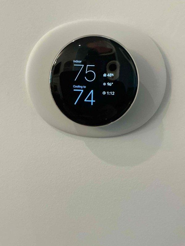 Completed comprehensive heating tune-up and safety inspection on two 8-year-old furnace systems located in basement. Performed standard maintenance procedures including filter inspection, burner assembly cleaning, heat exchanger examination, blower motor lubrication, and combustion analysis on both units to ensure optimal efficiency and safe operation. Verified thermostat operation and system controls functioning properly, with cooling system actively maintaining setpoint at time of service.