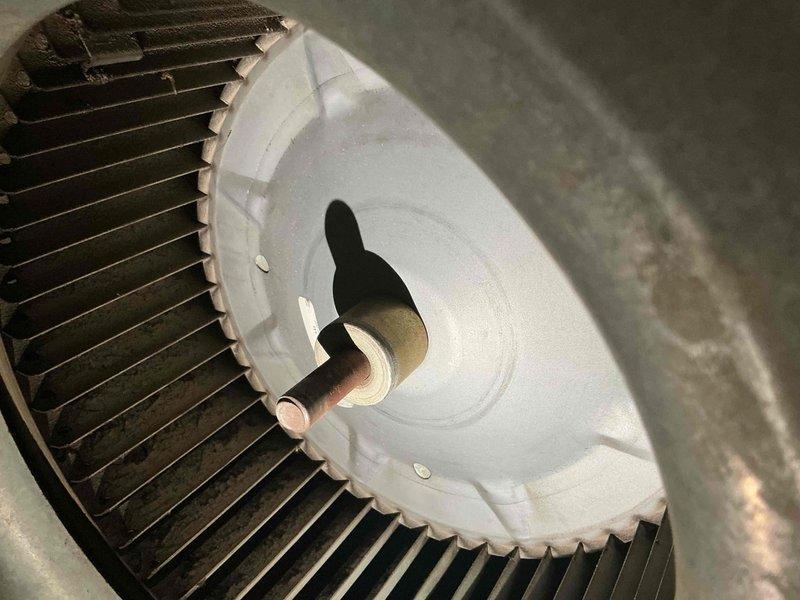 Completed routine AC tune-up and preventative maintenance on a 7-year-old Carrier air conditioning system (Model: CNPVP2414ALAA, Serial: 182TX21629) utilizing R-410A refrigerant. Performed comprehensive inspection of outdoor condensing unit, verified manufacturer specifications and safety labels, inspected indoor blower assembly and confirmed proper operation of centrifugal fan wheel. System operating within normal parameters with no deficiencies noted at time of service.