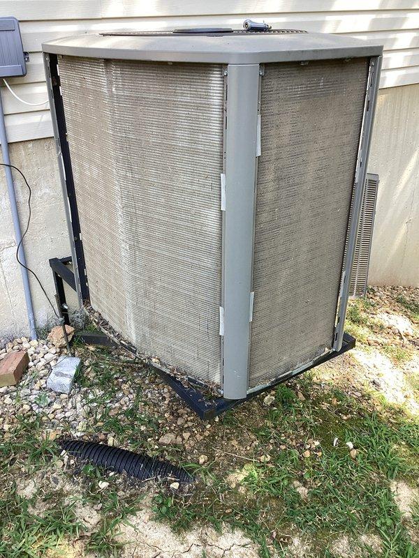 Completed comprehensive AC tune-up service on residential cooling system per Home Depot promotional offer. Performed full system diagnostics using refrigerant manifold gauges, verified proper refrigerant pressures and temperatures, inspected outdoor condenser unit for debris accumulation and airflow restrictions, and confirmed all components operating within normal parameters. System found in good working condition with no immediate service needs identified; provided customer with furnace tune-up pricing information for future consideration.