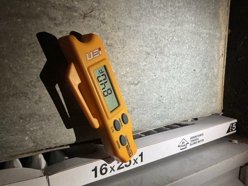 Responded to no cooling complaint on 10+ year old outdoor unit. Upon arrival, confirmed outdoor fan motor operating but system not producing cool air. Performed diagnostic temperature measurements, recording 81.8°F at return air filter and 66.9°F at equipment. Identified cooling system failure preventing proper refrigeration cycle operation.