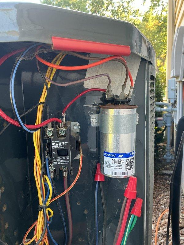 Responded to no cooling complaint on 6-year-old Trane system. Upon arrival, performed diagnostic inspection of outdoor unit and accessed electrical compartment to evaluate capacitor, contactor, and associated wiring connections. Inspected dual-run capacitor marked 45/5 MFD dated 9/1/22, tested electrical components, and verified proper wire terminations on contactor and capacitor terminals. Documented system condition with photos of internal electrical components for service records, completed necessary repairs to restore cooling operation to entire home.
