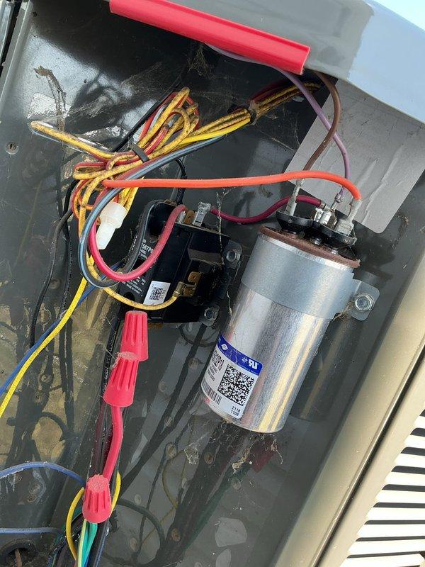 Responded to no cooling complaint on 3-year-old Trane system with indoor temperature at 81°F. Found outdoor unit not operating while indoor fan running normally. Diagnosed failed dual run capacitor preventing compressor and condenser fan operation, confirmed by testing capacitance values at 63°F ambient temperature. Replaced defective capacitor with manufacturer-specified replacement, restored proper system operation, and verified cooling cycle engaging correctly.