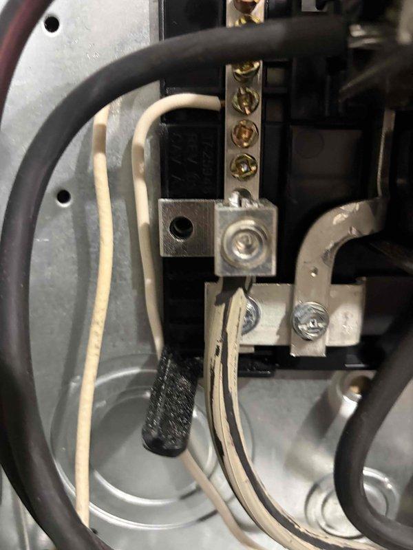 Returned to property to address failed inspection items on previous electrical installation. Corrected deficiencies in main electrical panel including proper wire terminations, organized and secured grounding conductors to grounding bar per code requirements, and ensured all circuit breaker connections met NEC standards. Inspected and remediated loose or improper wire connections at terminal blocks, removed damaged wire material, and verified all electrical connections were tight and properly torqued. All corrections documented with photographs for inspection approval.