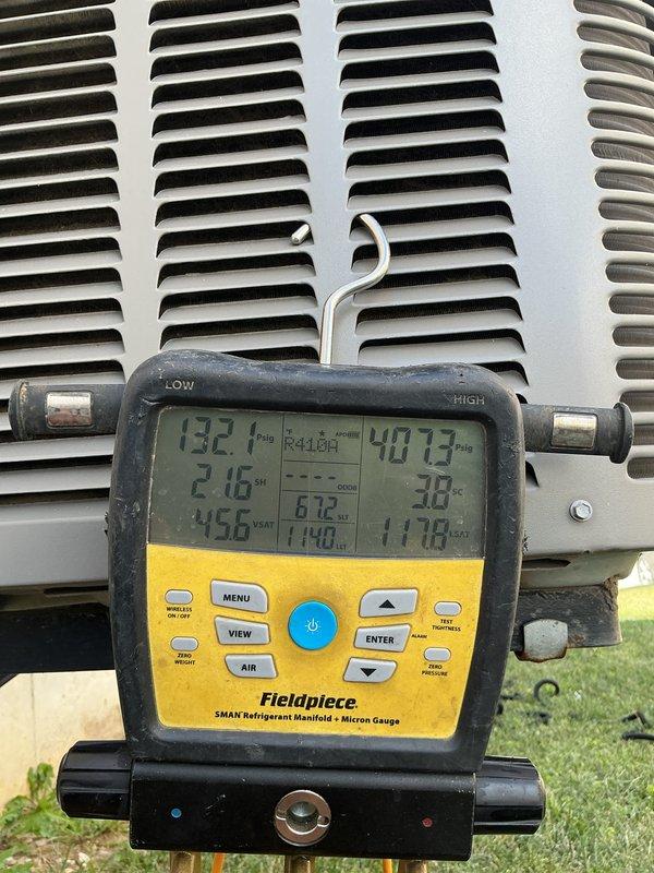 Completed comprehensive tune-up and maintenance on 10-year-old residential air conditioning system with outdoor condensing unit. Replaced heavily contaminated air filter that showed significant dust and debris accumulation throughout pleated media. Performed complete system diagnostics using refrigerant manifold gauges, recording operating pressures of 132.1 PSIG high side and 40.73 PSIG low side with superheat and subcooling measurements confirming proper refrigerant charge and system performance. All components inspected and system operating within normal parameters.