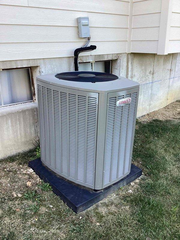 Responded to no cooling complaint on 7-year-old Lennox residential air conditioning system. Upon arrival, confirmed unit was blowing warm air with supply register temperature reading 61.6°F, indicating inadequate cooling. Inspected outdoor condenser unit and found system operational but not performing to specifications. Advised customer to shut off humidifier as instructed. Documented equipment condition and temperature readings for diagnostic purposes.