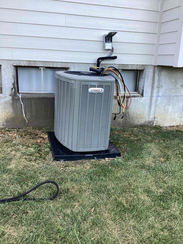 Completed comprehensive cooling season tune-up on 10-year-old Lennox ground-level condenser unit located at rear of property. Performed full system inspection including refrigerant line assessment, electrical connections verification, condenser coil cleaning, and operational testing. Unit operating within normal parameters with all components functioning properly at time of service completion.