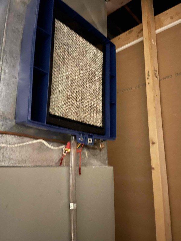 Performed comprehensive HVAC Supertune maintenance on 15-year-old Emerald brand furnace and air conditioning system. Conducted thorough inspection of all internal components including blower motor assembly, gas burner tubes, ignition system, and electrical connections. Verified proper operation of all colored wiring harnesses and control circuits throughout the unit. Inspected and evaluated mesh filter condition in blue air handler housing, confirming adequate airflow. Checked condensate drainage line for proper function and verified all ductwork connections. All system components found operating within normal parameters with no immediate service needs identified.