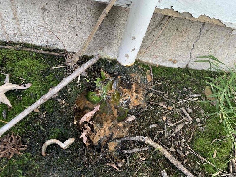 Responded to no cooling complaint on 8-year-old Lennox central air conditioning system with attic-mounted air handler. Upon arrival, discovered condensate drain line completely blocked, causing secondary drain pan to overflow and trip safety float switch, which shut down the system. Cleared obstruction from primary drain line, flushed condensate system with approved cleaning solution, and verified proper drainage flow. Tested float switch operation and confirmed system restored to normal cooling operation with proper airflow and temperature differential across evaporator coil.