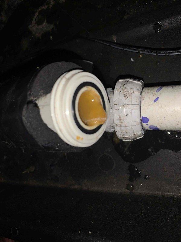 Responded to no cooling complaint on 8-year-old Lennox central air conditioning system with attic-mounted air handler. Upon arrival, discovered condensate drain line completely blocked, causing secondary drain pan to overflow and trip safety float switch, which shut down the system. Cleared obstruction from primary drain line, flushed condensate system with approved cleaning solution, and verified proper drainage flow. Tested float switch operation and confirmed system restored to normal cooling operation with proper airflow and temperature differential across evaporator coil.