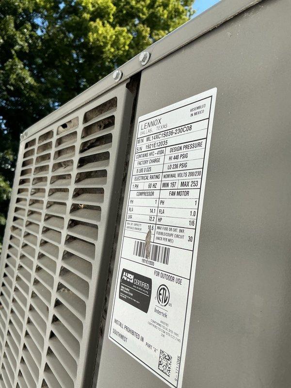 Returned to property to diagnose electrical short in first floor air conditioning system as previously noted. Inspected furnace control board and traced wiring connections to locate short circuit. Examined Lennox SL13-AC1S outdoor condensing unit and verified electrical components. Documented circuit board condition and wiring harness for repair recommendations on two-unit system.