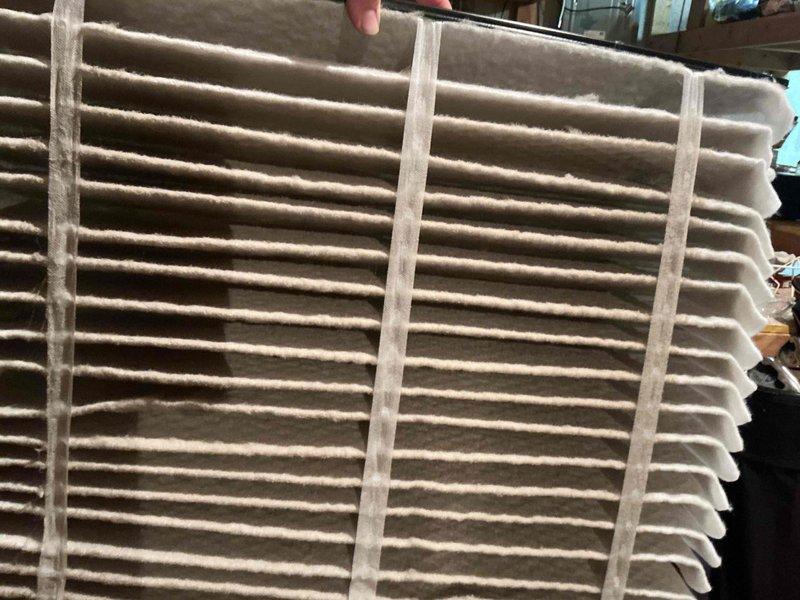 Completed cooling maintenance tune-up on residential HVAC system for new homeowners seeking preventive service verification. System was operating properly upon arrival with no reported cooling issues. Inspected air filter and found moderate dust accumulation on pleated media, indicating normal usage and filtration effectiveness. Examined supply register and ductwork accessibility, performed standard cooling system diagnostics, and confirmed all components functioning within normal parameters.