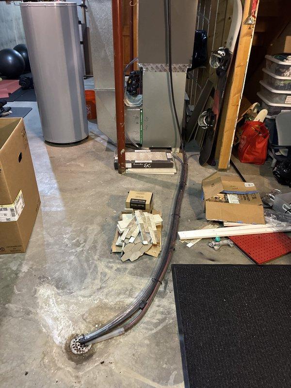 Replaced evaporator coil on second-floor HVAC system and removed one of two existing filter driers to bring system to proper configuration. All defective components were disposed of, and system was returned to proper operation.